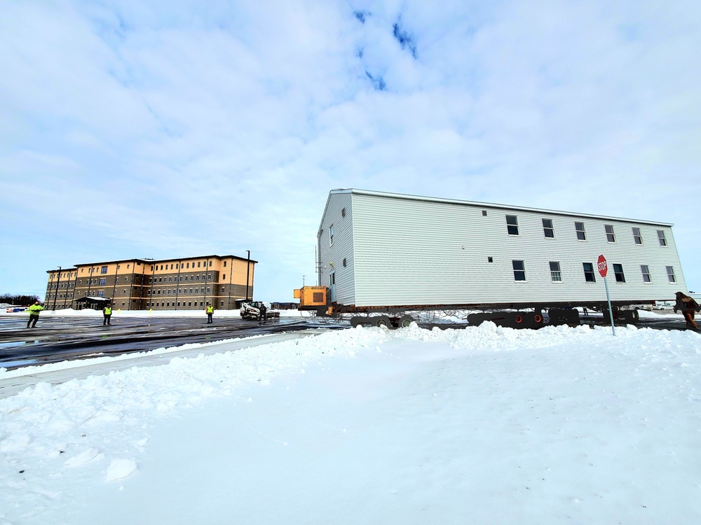 History made: Contractor moves first two World War II-era barracks at Fort McCoy