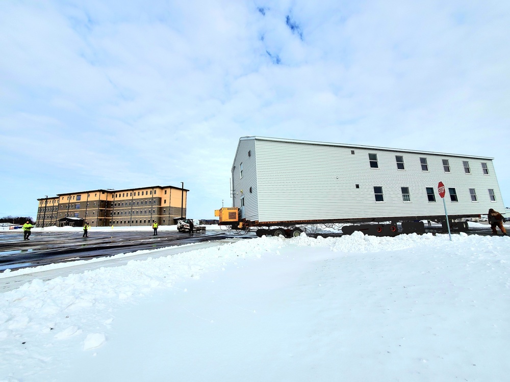 History made: Contractor moves first two World War II-era barracks at Fort McCoy