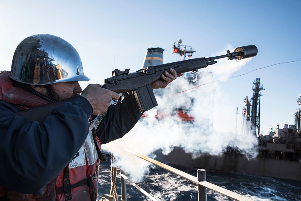 USS MCFAUL CONDUCTS A REPLENISHMENT-AT-SEA