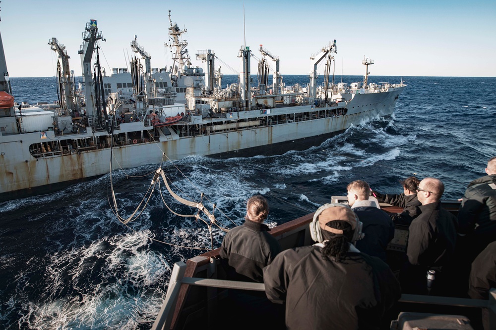 USS MCFAUL CONDUCTS A REPLENISHMENT-AT-SEA