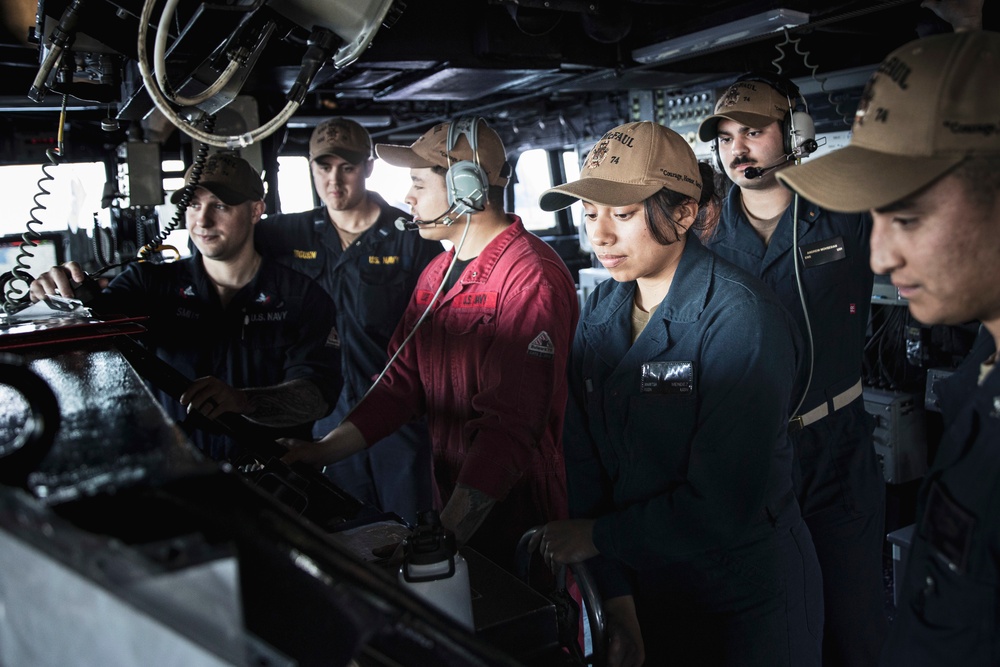 USS MCFAUL CONDUCTS A REPLENISHMENT-AT-SEA