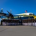 Marines of the Silent Drill Platoon, perform during the Blue Angels’ “Fat Albert” C-130J Super Hercules fly-over at Marine Corps Air Station, Yuma, Ariz.