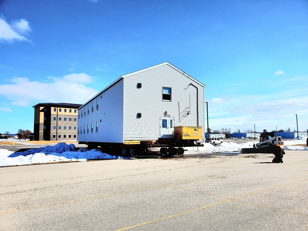 History made: Contractor moves first two World War II-era barracks at Fort McCoy