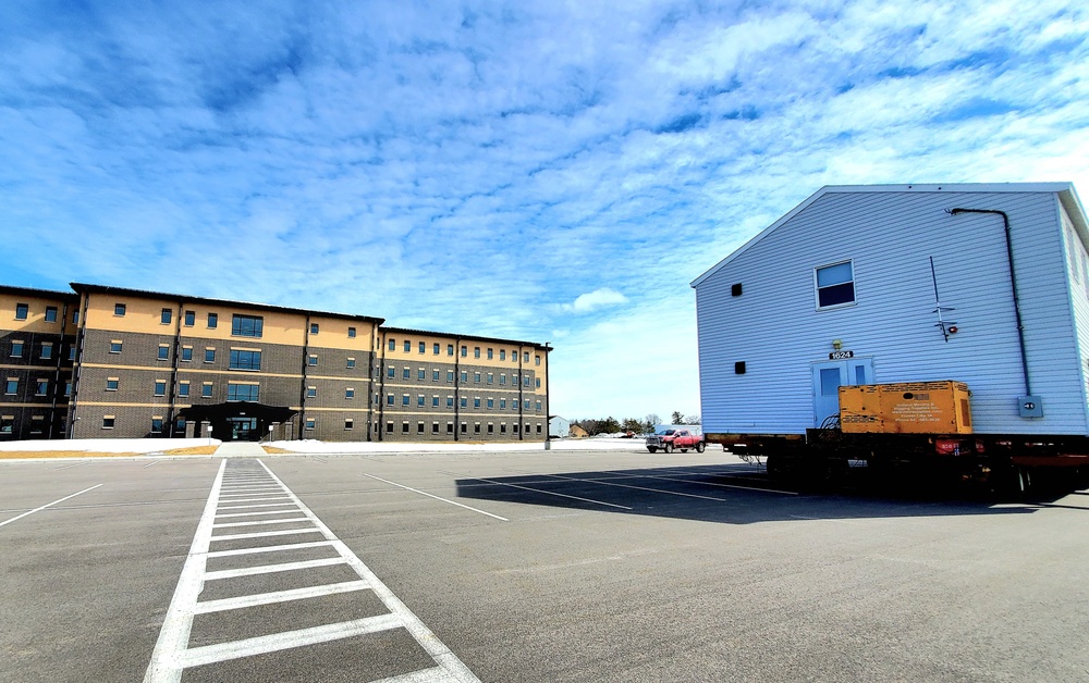 History made: Contractor moves first two World War II-era barracks at Fort McCoy