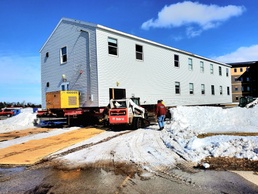 History made: Contractor moves first two World War II-era barracks at Fort McCoy