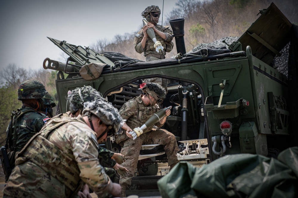 Thai and U.S. Soldiers fire mortars together during Cobra Gold 23