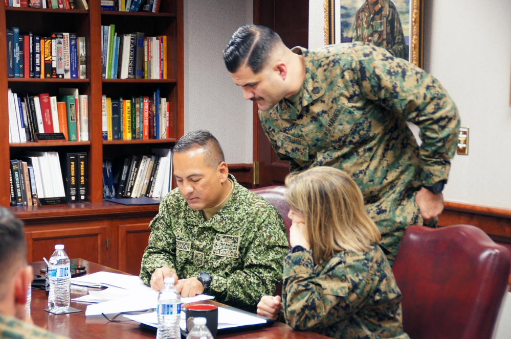 U.S. Marine Corps Col. Reginald J. McClam gives a base tour to the Commandant of the Columbian Marine Corps