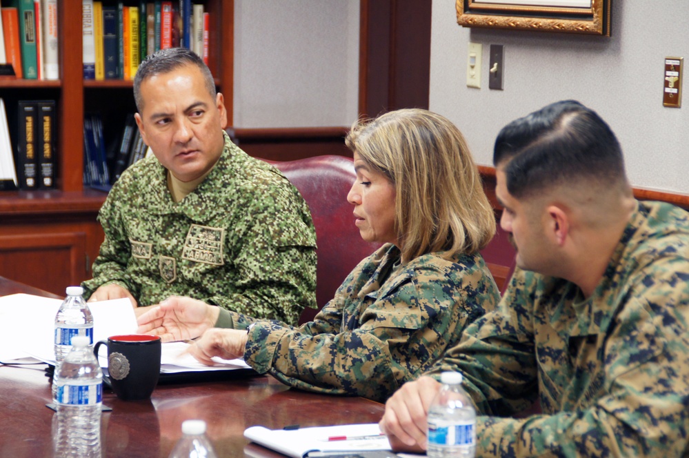 U.S. Marine Corps Col. Reginald J. McClam gives a base tour to the Commandant of the Columbian Marine Corps