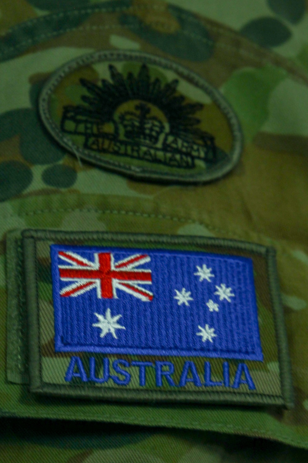 Australian Defense Force - Army Major speaks with U.S. Marines at Marine Corp Logistics Operations Group