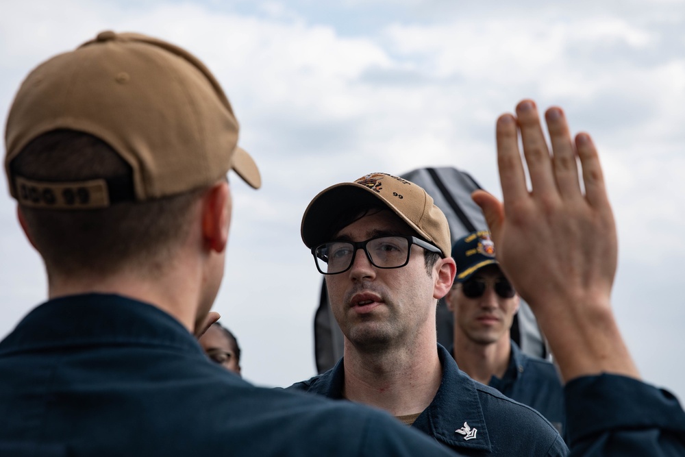 USS Farragut Sailor Reenlists While Underway