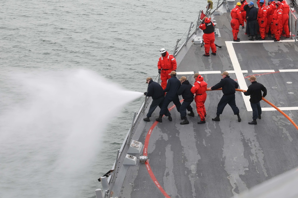 USS Thomas Hudner gets underway for COMPTUEX