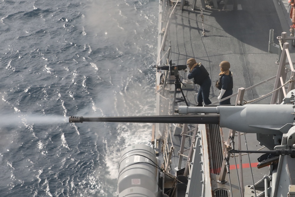 USS Thomas Hudner (DDG 116) conducts a test of its M240 and .50 caliber machine guns