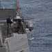 USS Thomas Hudner (DDG 116) conducts a test of its .50 caliber machine guns