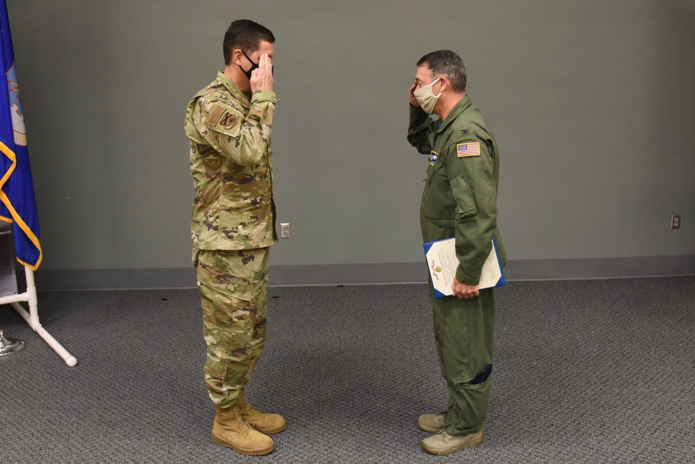 Senior Master Sgt. Steve Griffith is awarded the Meritorious Service Medal