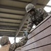 U.S. Marines with 3rd Maintenance Battalion and Republic of Korea Marines maneuver obstacle courses together during Korean Marine Exercise Program