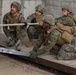 U.S. Marines with 3rd Maintenance Battalion and Republic of Korea Marines maneuver obstacle courses together during Korean Marine Exercise Program