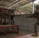 U.S. Marines with 3rd Maintenance Battalion and Republic of Korea Marines maneuver obstacle courses together during Korean Marine Exercise Program