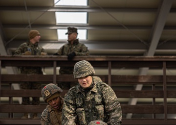 U.S. Marines with 3rd Maintenance Battalion and Republic of Korea Marines maneuver obstacle courses together during Korean Marine Exercise Program