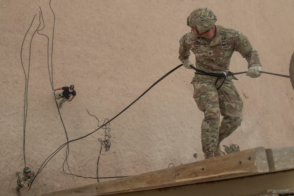 Rappel Master course attacks the rappel tower in Kuwait