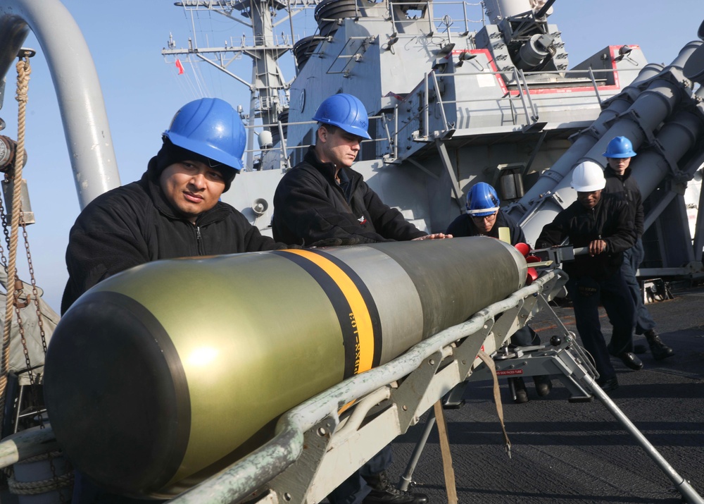 USS Milius Conducts Torpedo Upload While Operating in the Philippine Sea