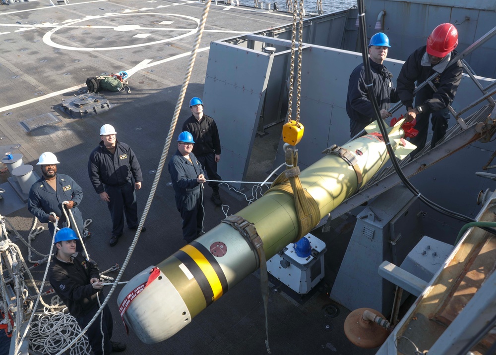 USS Milius Conducts Torpedo Upload While Operating in the Philippine Sea
