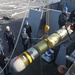 USS Milius Conducts Torpedo Upload While Operating in the Philippine Sea