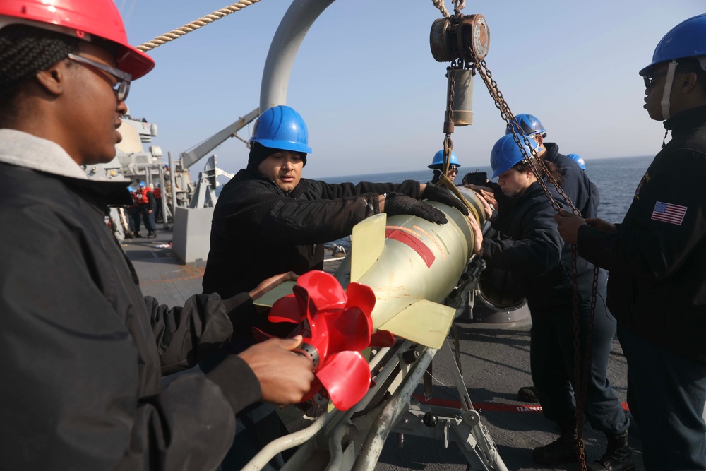 USS Milius Conducts Torpedo Upload While Operating in the Philippine Sea
