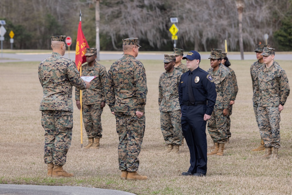 Officer Gabriel George receives the Navy &amp; Marine Corps Commendation Medal at MCAS Beaufort