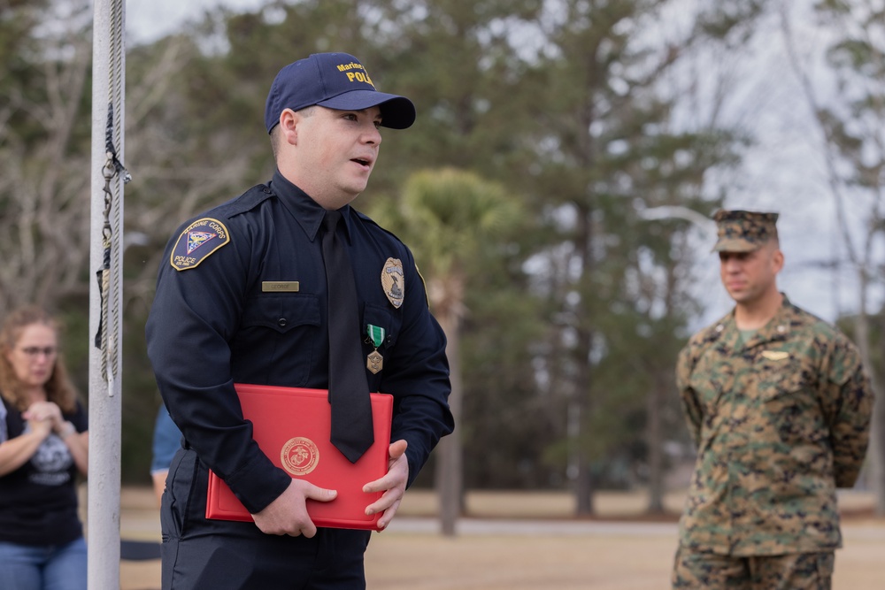 Officer Gabriel George receives the Navy &amp; Marine Corps Commendation Medal at MCAS Beaufort