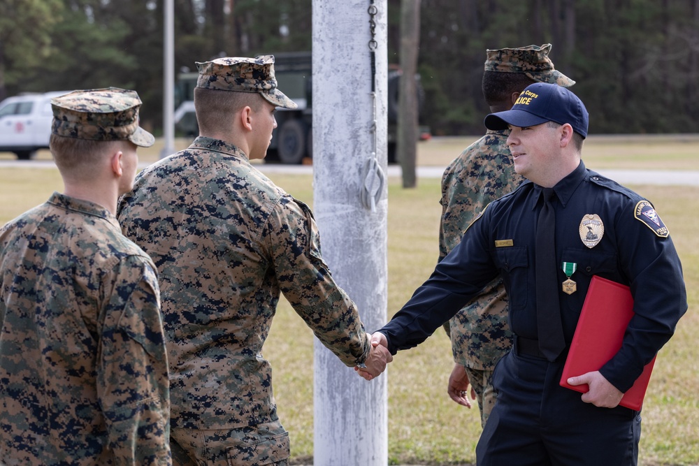 Officer Gabriel George receives the Navy &amp; Marine Corps Commendation Medal at MCAS Beaufort