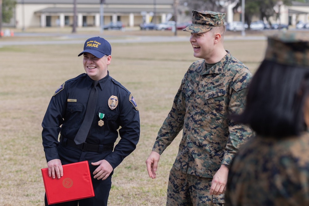 Officer Gabriel George receives the Navy &amp; Marine Corps Commendation Medal at MCAS Beaufort