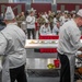 Sgt. Jacob Hernandez and Sgt. Steven Philipps prepare an entree