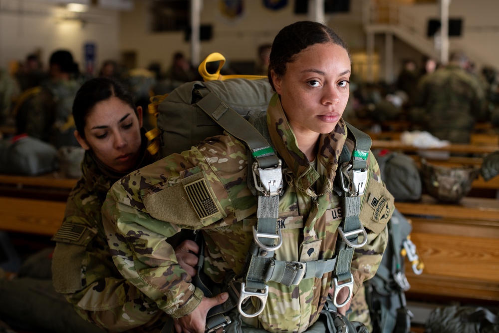 Ladies of 11th Airborne leap during all-women jump