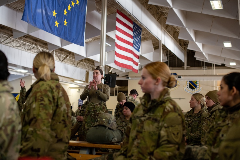 Ladies of 11th Airborne leap during all-women jump