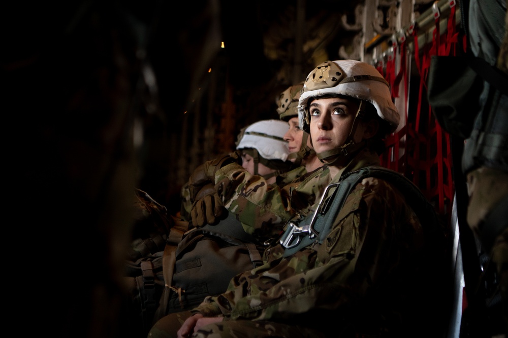 Ladies of 11th Airborne leap during all-women jump