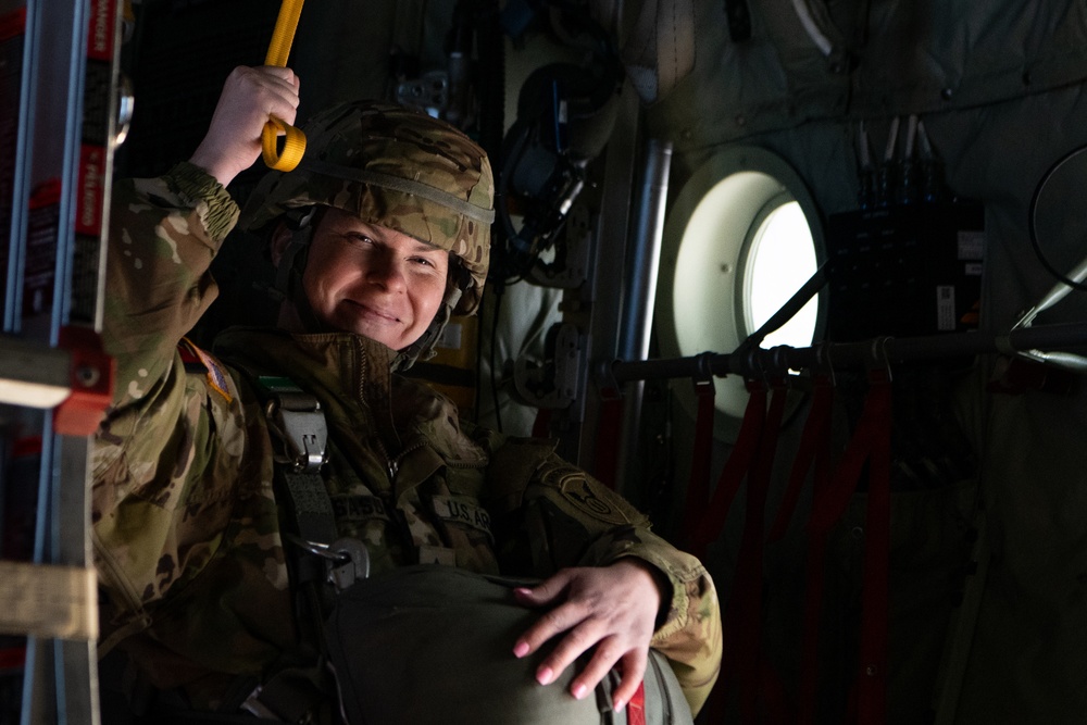 Ladies of 11th Airborne leap during all-women jump