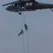 Task Force Spartan Soldiers rappel from Black Hawks during Rappel Master Course