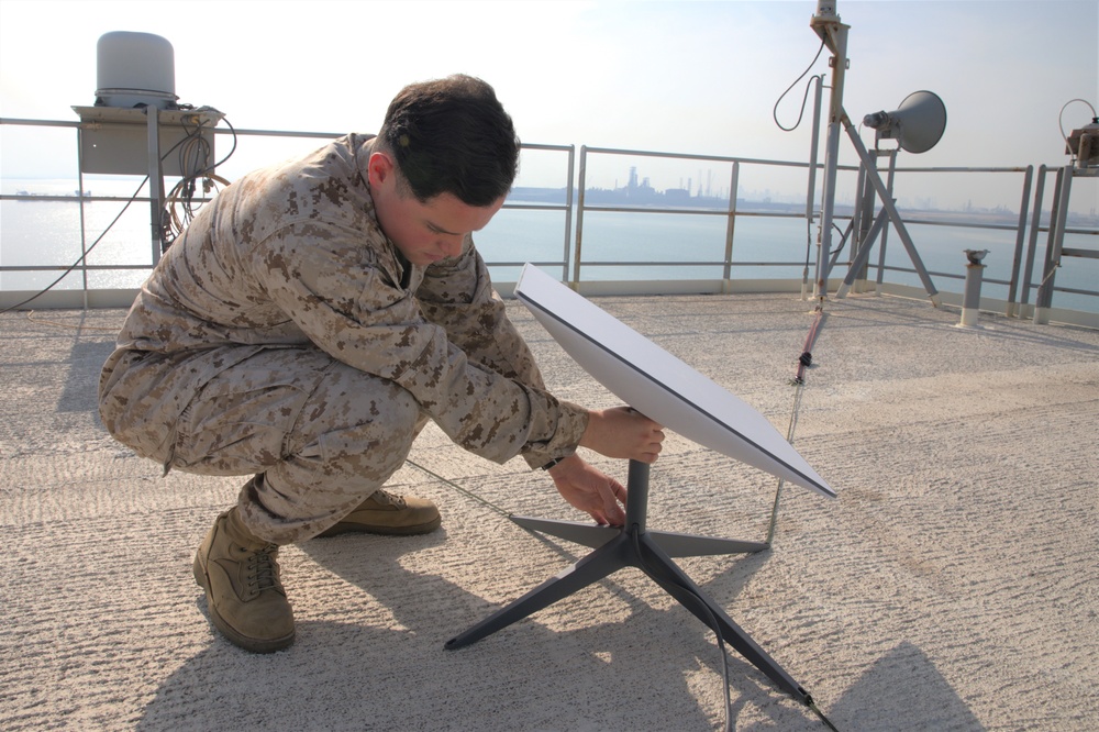 Naval Integration in Practice: Marine Reservist earns Navy Surface Warfare Insignia Aboard USS Lewis B. Puller