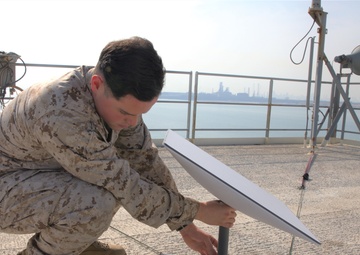 Naval Integration in Practice: Marine Reservist earns Navy Surface Warfare Insignia Aboard USS Lewis B. Puller