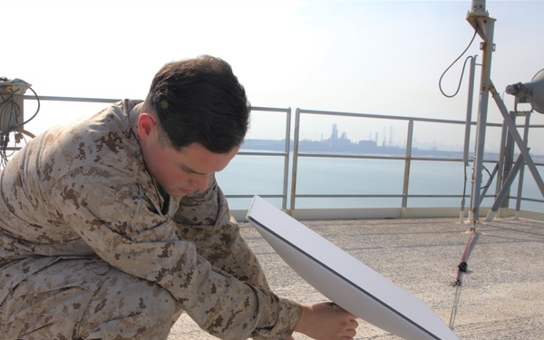 Naval Integration in Practice: Marine Reservist earns Navy Surface Warfare Insignia Aboard USS Lewis B. Puller