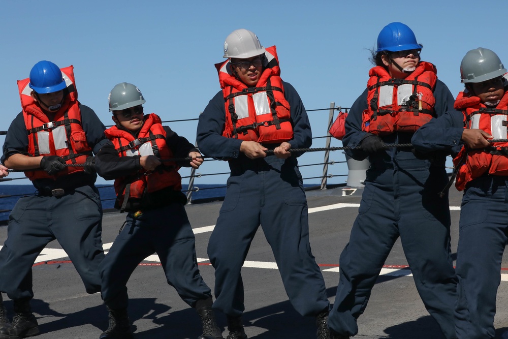 USS Thomas Hudner (DDG 116) heave line during a replenishment at sea