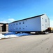 Contractors move second World War II-era barracks building at Fort McCoy