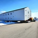 Contractors move second World War II-era barracks building at Fort McCoy