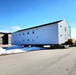 Contractors move second World War II-era barracks building at Fort McCoy