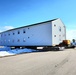 Contractors move second World War II-era barracks building at Fort McCoy