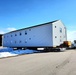 Contractors move second World War II-era barracks building at Fort McCoy