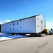 Contractors move second World War II-era barracks building at Fort McCoy