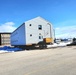 Contractors move second World War II-era barracks building at Fort McCoy