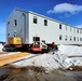 Contractors move second World War II-era barracks building at Fort McCoy