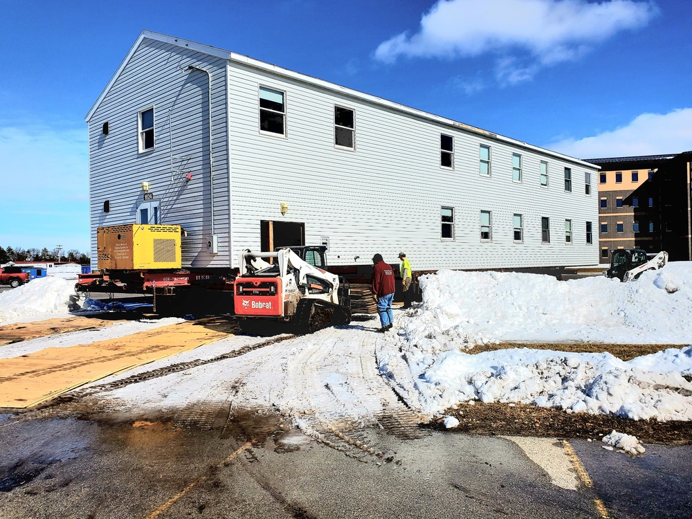 Contractors move second World War II-era barracks building at Fort McCoy